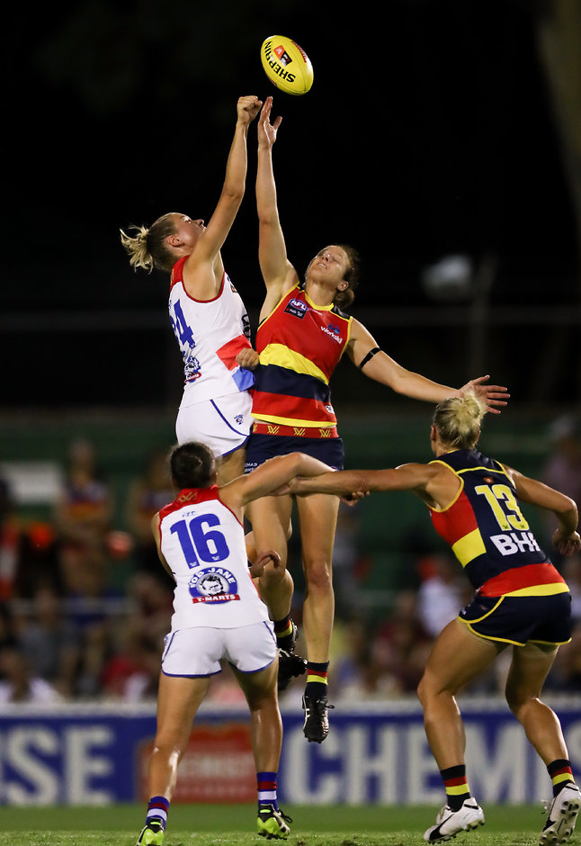 AFLW 2019 Rd 01 - Adelaide v Western Bulldogs ADELAIDE, AUSTRALIA - FEBRUARY 02: Kimberley Rennie of the Bulldogs clashes with Jessica Foley of the Crows during the 2019 NAB AFLW Round 01 match between the Adelaide Crows and the Western Bulldogs at Norwood Oval on February 02, 2019 in Adelaide, Australia. (Photo by AFL Media)