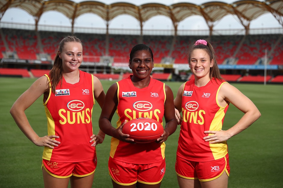 AFLW 2019 Media - Gold Coast Suns Media Opportunity GOLD COAST, AUSTRALIA - FEBRUARY 08: Charlotte Hammans, Kitara Whap-Farrar and Ellie Hampson pose during a Gold Coast Suns AFLW Media Opportunity on February 08, 2019 in Gold Coast, Australia. (Photo by Chris Hyde/Getty Images/AFL Media)