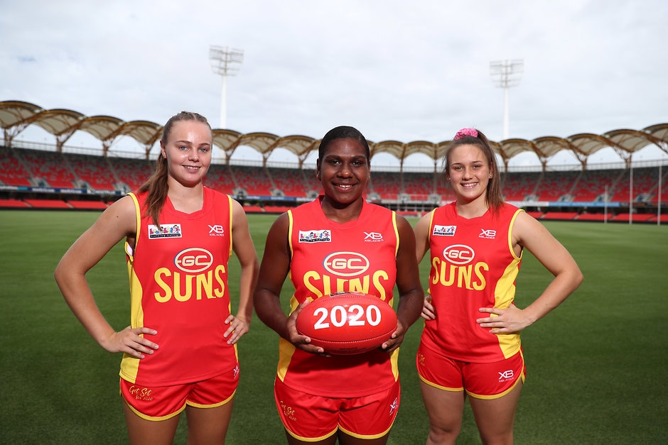 AFLW 2019 Media - Gold Coast Suns Media Opportunity GOLD COAST, AUSTRALIA - FEBRUARY 08: Charlotte Hammans, Kitara Whap-Farrar and Ellie Hampson pose during a Gold Coast Suns AFLW Media Opportunity on February 08, 2019 in Gold Coast, Australia. (Photo by Chris Hyde/Getty Images/AFL Media)