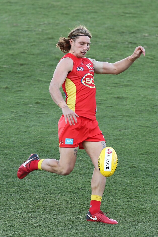 AFL 2019 Training - Gold Coast v Brisbane Practice Match GOLD COAST, AUSTRALIA - FEBRUARY 23: Brad Scheer of the Suns kicks during the AFL pre-season practice match between the Gold Coast Suns and the Brisbane Lions at Metricon Stadium on February 23, 2019 in Gold Coast, Australia. (Photo by Chris Hyde/Getty Images)