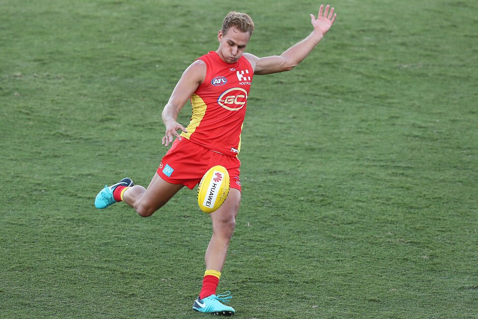 AFL 2019 Training - Gold Coast v Brisbane Practice Match GOLD COAST, AUSTRALIA - FEBRUARY 23: Will Brodie of the Suns kicks during the AFL pre-season practice match between the Gold Coast Suns and the Brisbane Lions at Metricon Stadium on February 23, 2019 in Gold Coast, Australia. (Photo by Chris Hyde/Getty Images)