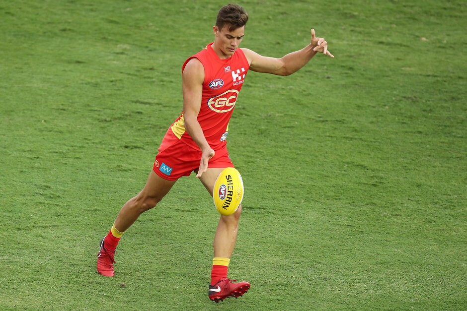 AFL 2019 Training - Gold Coast v Brisbane Practice Match GOLD COAST, AUSTRALIA - FEBRUARY 23: Jacob Heron of the Suns kicks during the AFL pre-season practice match between the Gold Coast Suns and the Brisbane Lions at Metricon Stadium on February 23, 2019 in Gold Coast, Australia. (Photo by Chris Hyde/Getty Images)