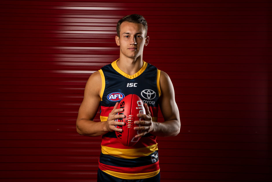 AFL 2019 Portraits - Adelaide Crows ADELAIDE, AUSTRALIA - FEBRUARY 25: Tom Doedee of the Crows poses for a photograph during the Adelaide Crows 2019 official team photo day at AAMI Stadium on February 25, 2019 in Adelaide, Australia. (Photo by James Elsby/AFL Media)