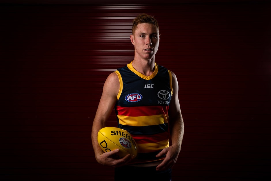 AFL 2019 Portraits - Adelaide Crows ADELAIDE, AUSTRALIA - FEBRUARY 25: Tom Lynch of the Crows poses for a photograph during the Adelaide Crows 2019 official team photo day at AAMI Stadium on February 25, 2019 in Adelaide, Australia. (Photo by James Elsby/AFL Media)