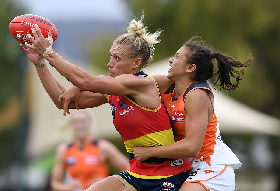 AFLW 2019 Round 06 - Adelaide v GWS ADELAIDE, AUSTRALIA - MARCH 10: Erin Phillips of the Adelaide Crows marks in front of Rebecca Beeson of the Giantsduring the round six AFLW match between the Adelaide Crows and the Greater Western Sydney Giants at Unley Oval on March 10, 2019 in Adelaide, Australia. (Photo by Mark Brake/Getty Images)