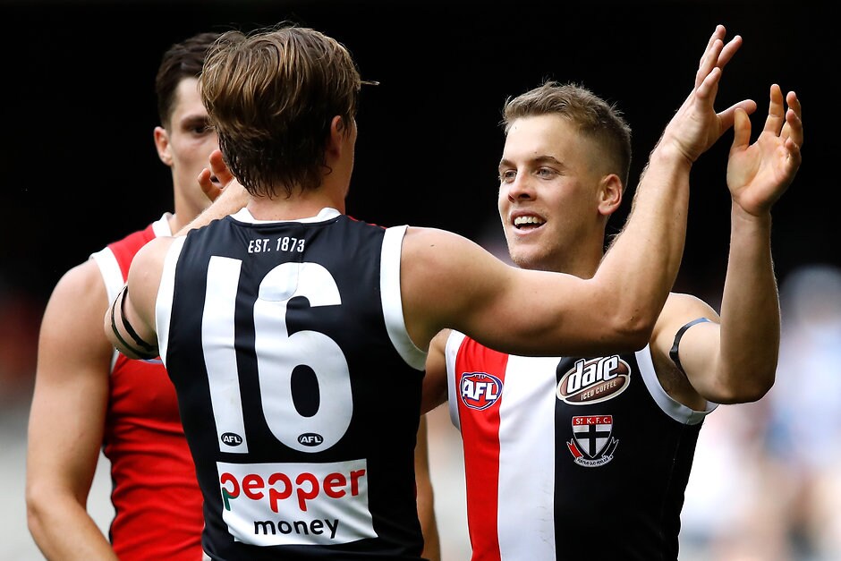 AFL 2019 Round 01 - St Kilda v Gold Coast MELBOURNE, AUSTRALIA - MARCH 24: Jack Lonie of the Saints celebrates a win with Jack Newnes of the Saints during the 2019 AFL round 01 match between the St Kilda Saints and the Gold Coast Suns at Marvel Stadium on March 24, 2019 in Melbourne, Australia. (Photo by Dylan Burns/AFL Photos)