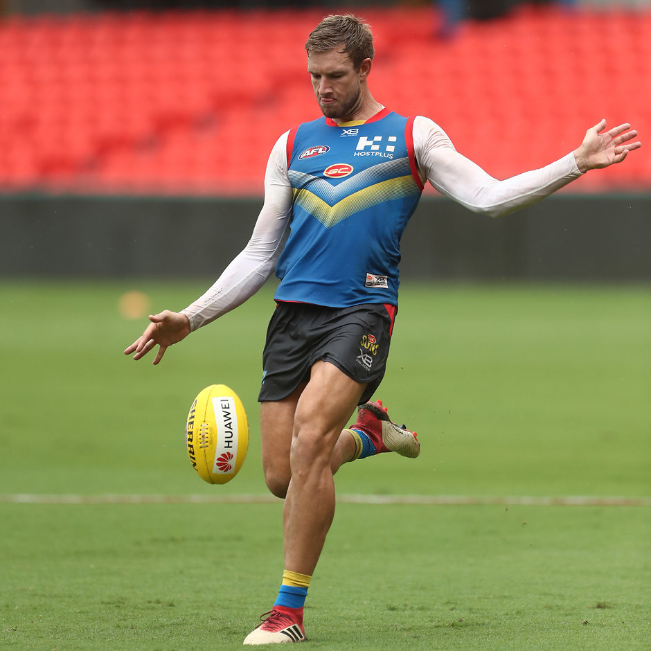 AFL 2019 Training - Gold Coast Suns 270319 GOLD COAST, AUSTRALIA - MARCH 27: Sam Day kicks during a Gold Coast Suns AFL training session at Metricon Stadium on March 27, 2019 in Gold Coast, Australia. (Photo by Chris Hyde/Getty Images)