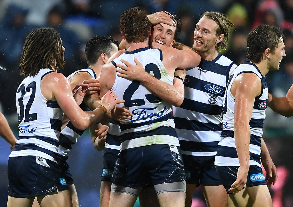 AFL 2019 Round 02 - Geelong v Melbourne GEELONG, AUSTRALIA - MARCH 30: Charlie Constable of the Cats is congratulated by team mates after kicking a goal during the round two AFL match between the Geelong Cats and the Melbourne Demons at GMHBA Stadium on March 30, 2019 in Geelong, Australia. (Photo by Quinn Rooney/Getty Images)