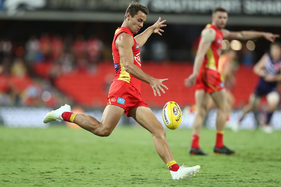 AFL 2019 Round 02 - Gold Coast v Fremantle GOLD COAST, AUSTRALIA - MARCH 31: Lachie Weller of the Suns in action during the round two AFL match between the Gold Coast Suns and the Fremantle Dockers at Metricon Stadium on March 31, 2019 in Gold Coast, Australia. (Photo by Chris Hyde/Getty Images)