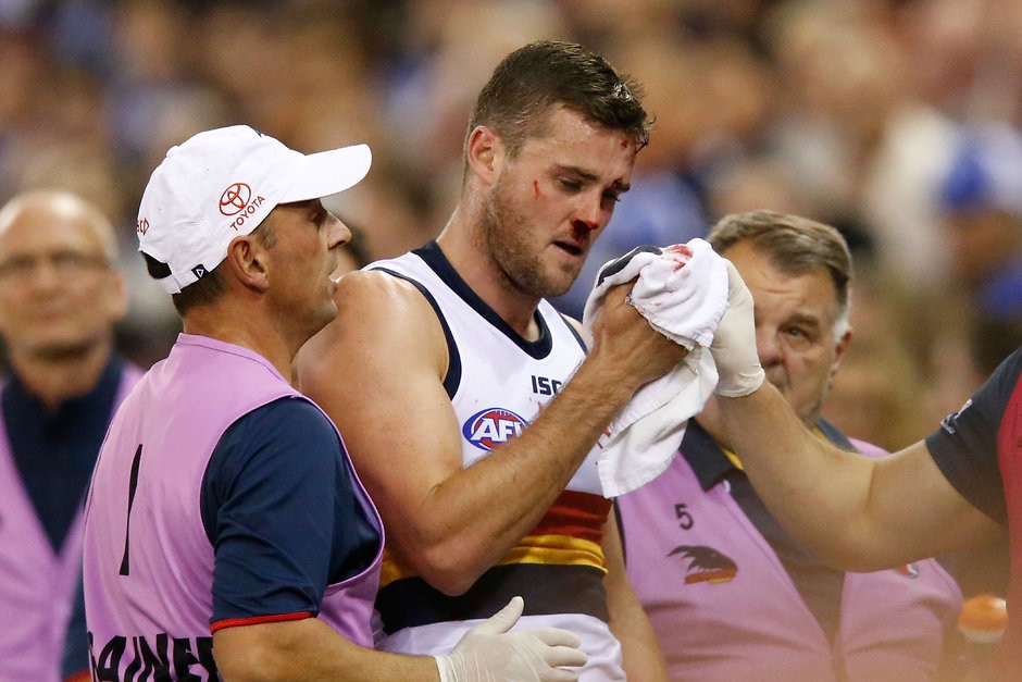 AFL 2019 Round 04 - North Melbourne v Adelaide MELBOURNE, AUSTRALIA - APRIL 13: Brad Crouch of the Crows comers from the field under the blood rule during the 2019 AFL round 04 match between the North Melbourne Kangaroos and the Adelaide Crows at Marvel Stadium on April 13, 2019 in Melbourne, Australia. (Photo by Darrian Traynor/AFL Photos)