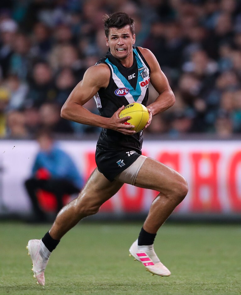 AFL 2019 Round 06 - Port Adelaide v North Melbourne ADELAIDE, AUSTRALIA - APRIL 26: Ryan Burton of the Power in action during the 2019 AFL round 06 match between the Port Adelaide Power and the North Melbourne Kangaroos at Adelaide Oval on April 26, 2019 in Adelaide, Australia. (Photo by Matt Turner/AFL Photos)