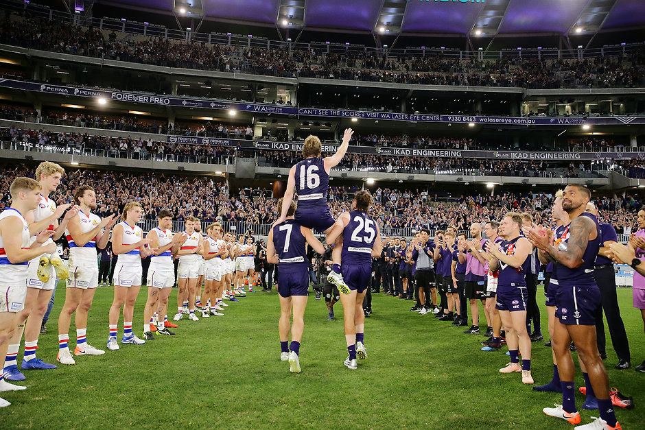 AFL 2019 Round 06 - Fremantle v Western Bulldogs David Mundy is chaired off after his 300th game and Fremantle's win over the Bulldogs in round six. - Fremantle,Fremantle Dockers