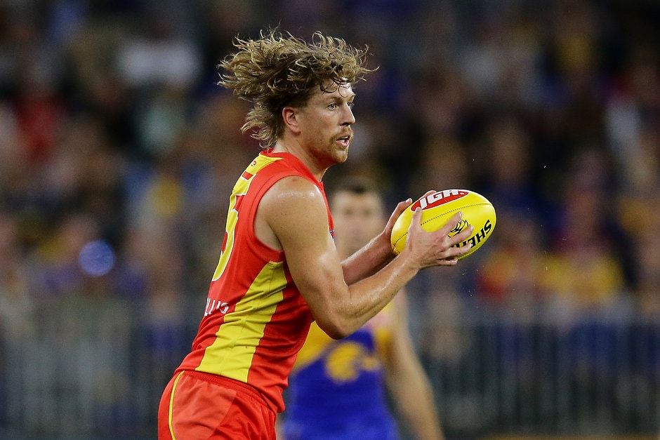 AFL 2019 Round 07 - West Coast v Gold Coast PERTH, AUSTRALIA - MAY 04: Aaron Young of the Suns looks to pass the ball during the 2019 AFL round 07 match between the West Coast Eagles and the Gold Coast Suns at Optus Stadium on May 04, 2019 in Perth, Australia. (Photo by Will Russell/AFL Photos)