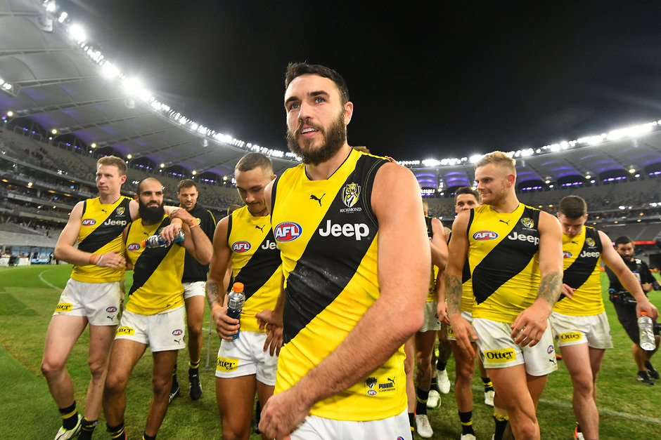 AFL 2019 Round 08 - Fremantle v Richmond PERTH, AUSTRALIA - MAY 12: Shane Edwards of the Tigers leads the team into the rooms during the 2019 AFL round 08 match between the Fremantle Dockers and the Richmond Tigers at Optus Stadium on May 12, 2019 in Perth, Australia. (Photo by Daniel Carson/AFL Photos)
