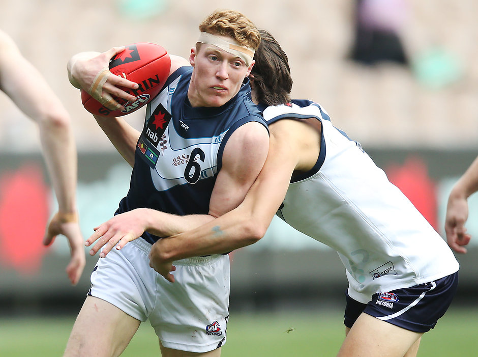 AFL 2019 U18 Championships - Vic Metro v Vic Country MELBOURNE, AUSTRALIA - JUNE 01: Matthew ROWELL of Vic Metro runs with the ball during the U18s match between Vic Metro and Vic Country at Melbourne Cricket Ground on June 01, 2019 in Melbourne, Australia. (Photo by Michael Dodge/Getty Images)