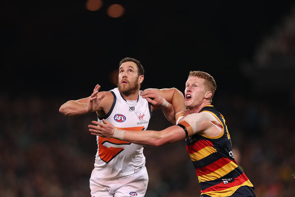AFL 2019 Round 12 - Adelaide v GWS ADELAIDE, AUSTRALIA - JUNE 08: Shane Mumford of the Giants competes with Reilly O'Brien of the Crows during the 2019 AFL round 12 match between the Adelaide Crows and the GWS Giants at the Adelaide Oval on June 08, 2019 in Adelaide, Australia. (Photo by James Elsby/AFL Photos)