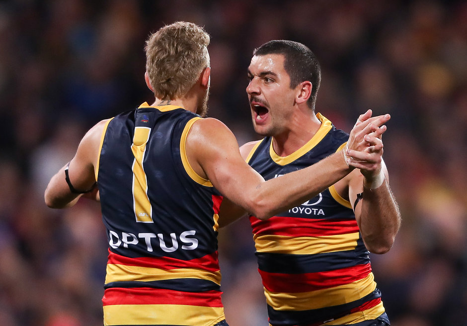 AFL 2019 Round 12 - Adelaide v GWS ADELAIDE, AUSTRALIA - JUNE 08: Taylor Walker of the Crows celebrates a goal with team mate Hugh Greenwood during the 2019 AFL round 12 match between the Adelaide Crows and the GWS Giants at the Adelaide Oval on June 08, 2019 in Adelaide, Australia. (Photo by Matt Turner/AFL Photos)