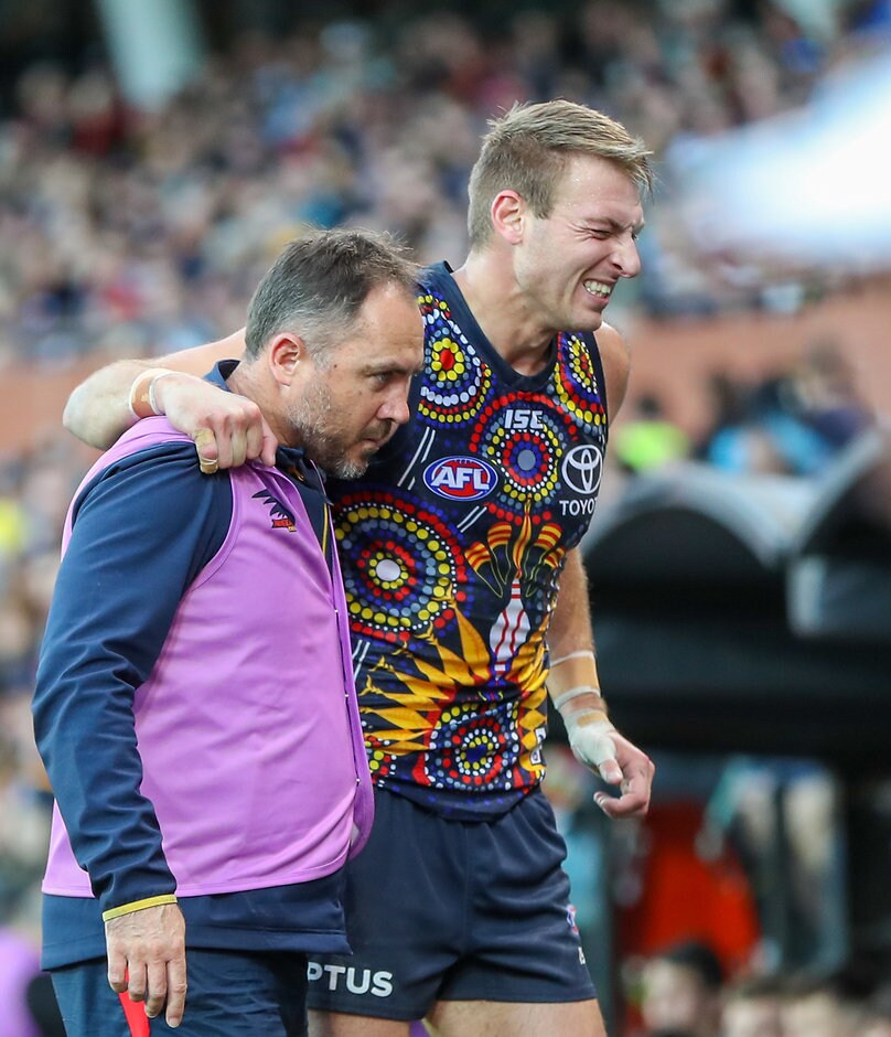 AFL 2019 Round 16 - Adelaide v Port Adelaide ADELAIDE, AUSTRALIA - JULY 06: Daniel Talia of the Crows leaves the field injured during the 2019 AFL round 16 match between the Adelaide Crows and the Port Adelaide Power at the Adelaide Oval on July 06, 2019 in Adelaide, Australia. (Photo by Matt Turner/AFL Photos)