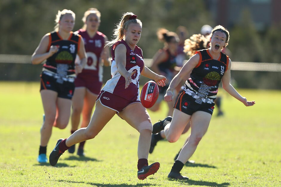 AFLW 2019 U18 Championships - Queensland v Central Allies GOLD COAST, AUSTRALIA - JULY 12: Annise Bradfield of Qld kicks during the NAB AFLW Under-18 Championships match between Queensland and the Central Allies at Bond University on July 12, 2019 in Gold Coast, Australia. (Photo by Chris Hyde/AFL Photos)