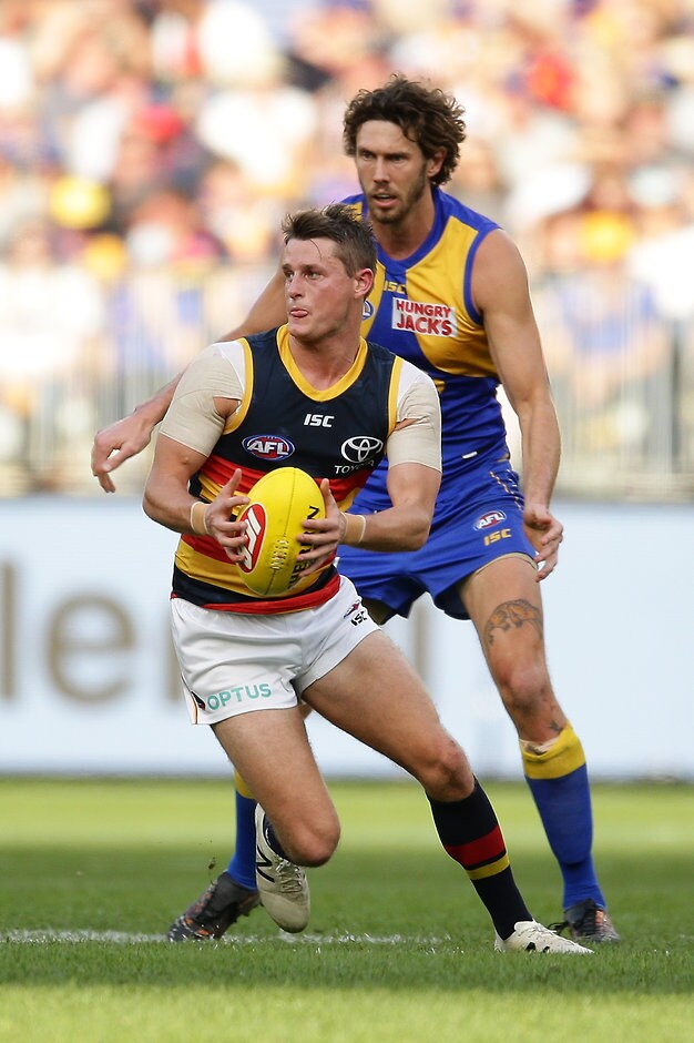 AFL 2019 Round 21 - West Coast v Adelaide PERTH, AUSTRALIA - AUGUST 11: Matt Crouch of the Crows looks to pass the ball during the 2019 AFL round 21 match between the West Coast Eagles and the Adelaide Crows at Optus Stadium on August 11, 2019 in Perth, Australia. (Photo by Will Russell/AFL Photos)