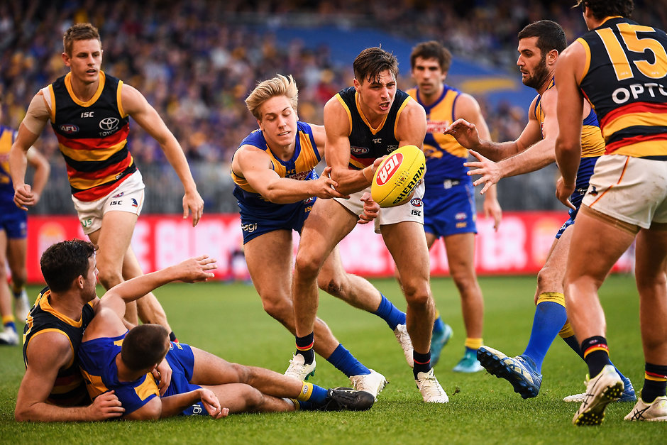 AFL 2019 Round 21 - West Coast v Adelaide PERTH, AUSTRALIA - AUGUST 11: Jake Kelly of the Crows handpasses the ball during the 2019 AFL round 21 match between the West Coast Eagles and the Adelaide Crows at Optus Stadium on August 11, 2019 in Perth, Australia. (Photo by Daniel Carson/AFL Photos)
