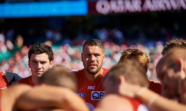 AFL 2019 Round 23 - Sydney v St Kilda SYDNEY, AUSTRALIA - AUGUST 24: Lance Franklin of the Swans looks on during a team huddle during the round 23 AFL match between the Sydney Swans and the St Kilda Saints at Sydney Cricket Ground on August 24, 2019 in Sydney, Australia. (Photo by Brett Hemmings/AFL Photos)