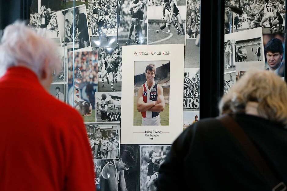AFL 2019 Media - Danny Frawley Tributes at Moorabbin MELBOURNE, AUSTRALIA - SEPTEMBER 10: Fans look at a tribute to Danny Frawley at St Kilda Saints Football Club on September 10, 2019 in Melbourne, Australia. Danny Frawley died yesterday aged 56 in a car accident at Ballarat. He was a former captain of the Saints and coached Richmond before embarking on a career in the media. (Photo by Darrian Traynor/Getty Images via AFL Photos)
